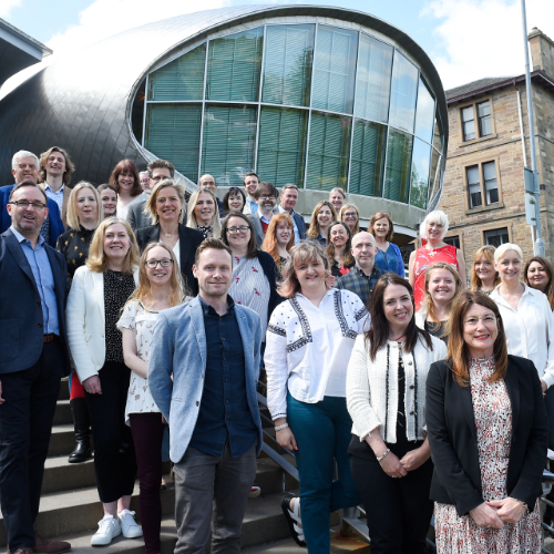 the 2022 DLP class standing on the steps outside the Craiglockhart campus