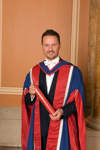 Mike Welch with his honorary degree following an Edinburgh Napier University graduation ceremony at the Usher Hall