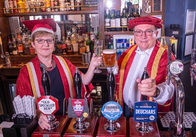 Principal Andrea Nolan and Chancellor Will Whitehorn in The Napier Graduate, the re-branded pub to mark Edinburgh Napier University's graduations