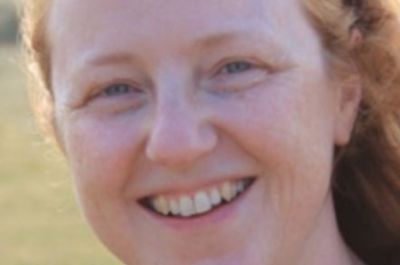 Smiling head shot image of Professor Diane Dixon