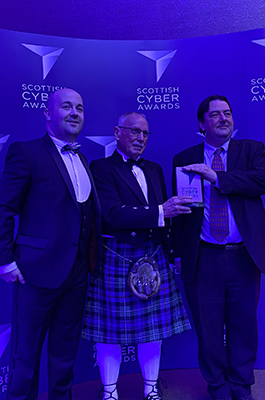 Phil Penrose with an award