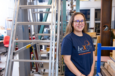 beX student Zarja next to ladders