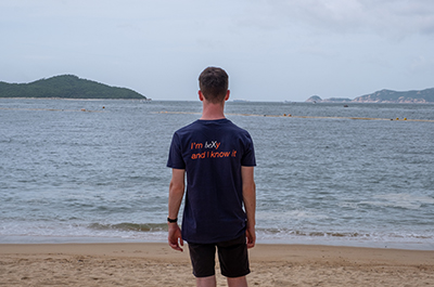 Jack Crombie looking out over a Hong Kong beach