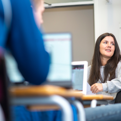 Female student sitting in a classroom