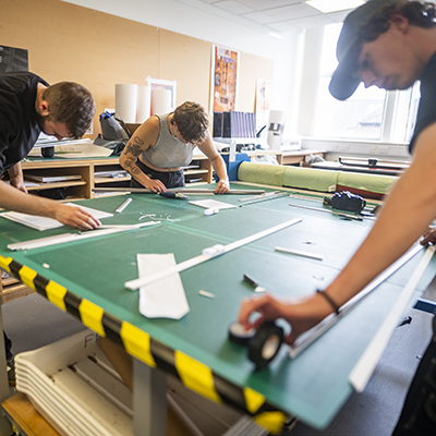 students cutting film