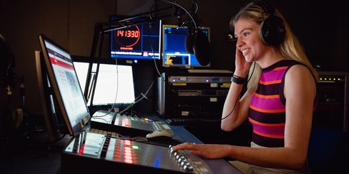 student in recording studio