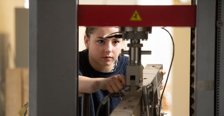 Louise Rodgers, a beX scholar, working on a machine