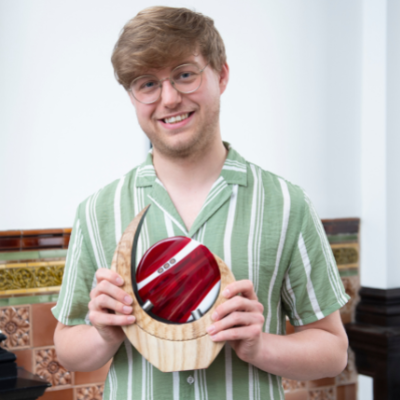 Bjorn holding his award