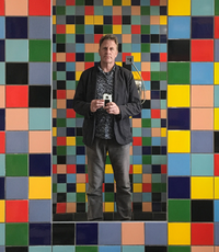 Mike Wilkinson in front of Colourful Background