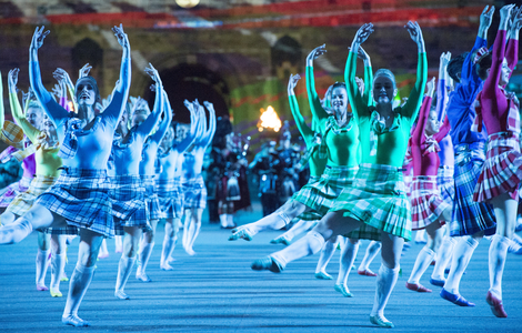 Traditional dancers performing in front of Edinburgh Castle at the Edinburgh Military Tattoo