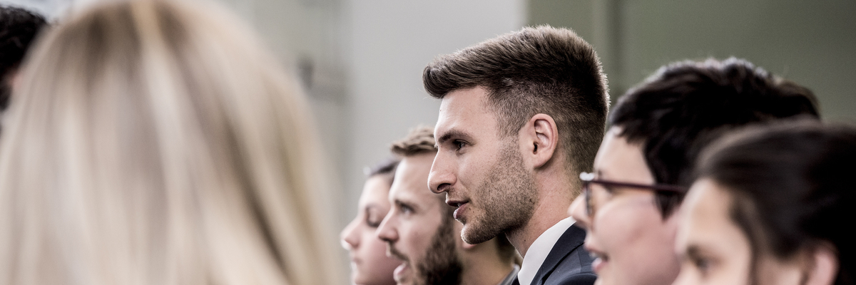 Photo of students meeting businessmen at industry event