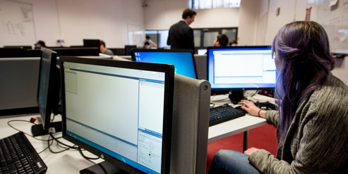 Student working in front of computer in the Computer Games Lab