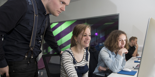 Students working in the Broadcast Newsroom at Merchiston Campus