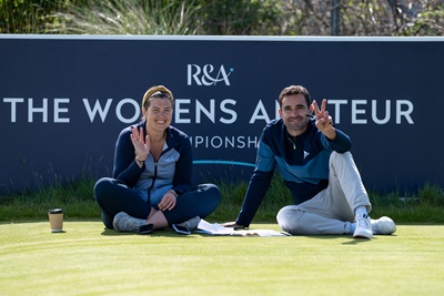 Lauren Witherspoon and a colleague sitting in front of a sign with reads 'The Women's Amateur