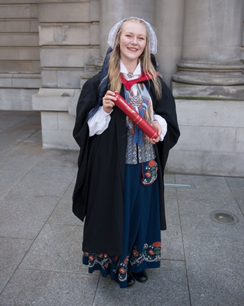 Maria Gran on graduation day wearing traditional Norwegian dress
