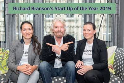 Sustainably's co founders sitting with Richard Branson