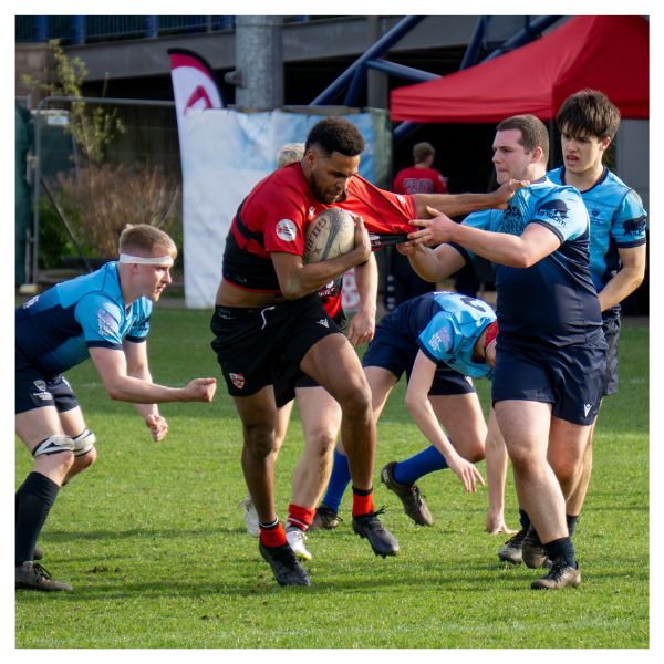 ENU's men's rugby team playing a match