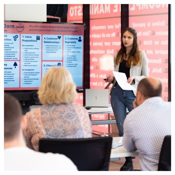 Entrepreneurial student presenting during a pitching competition