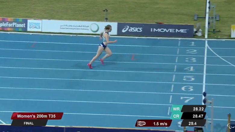 Maria Lyle running across the finishing line to win gold at the 2019 World Para Athletics Championships in Dubai