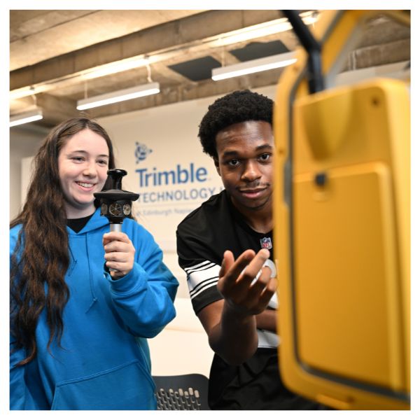 Two students working in Trimble Technology lab