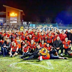 Group photo of Edinburgh Napier American Football Knights holding a trophy