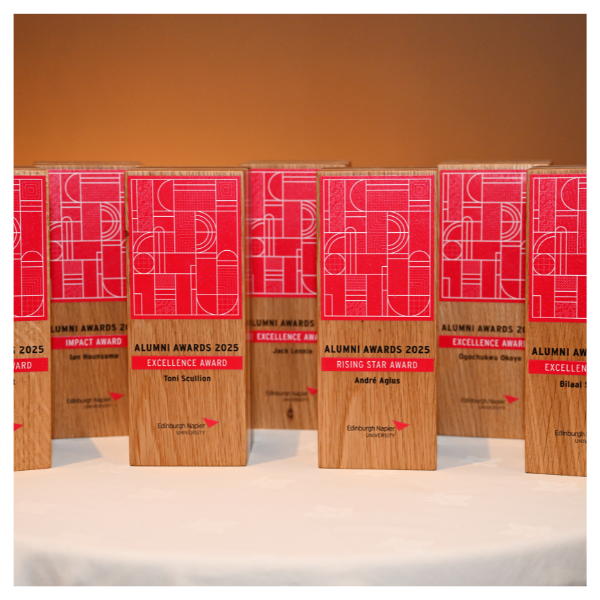 Alumni Award trophies, placed on a high table