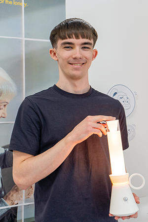Student Matthew Estevens with his prototype of Twindle.