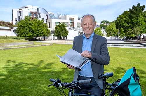 Dr Adrian Davis outside the Scottish Parliament