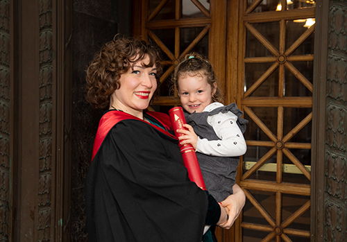 Charlotte Milliken with child outside Usher Hall