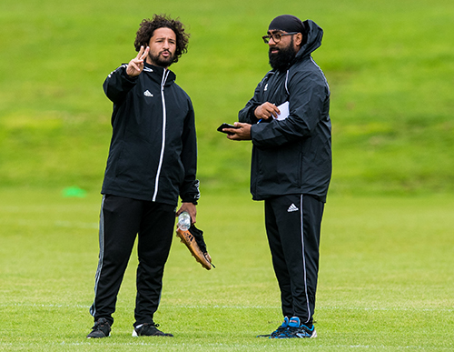 Scotland football coaches on the playing field