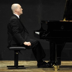 Image of man at piano