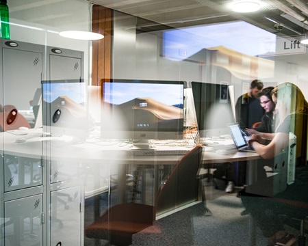 Students working in a computing lab at Edinburgh Napier University's Merchiston campus