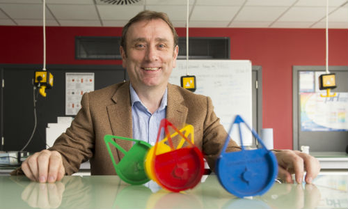 Portrait of Andrew Gallacher in classroom setting