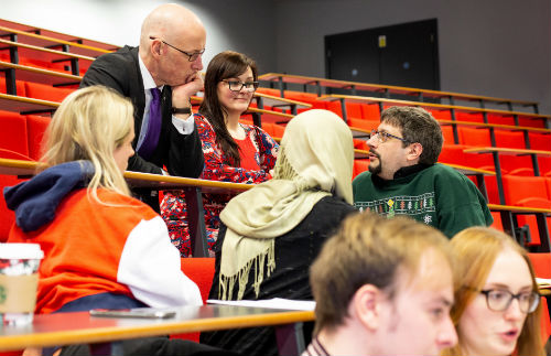 Cabinet Secretary John Swinney with teaching students