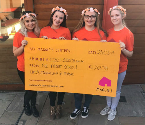 Izabel Termure, Claire Mordue, Lana McClorey and Morgan McCloud pictured with giant cheque
