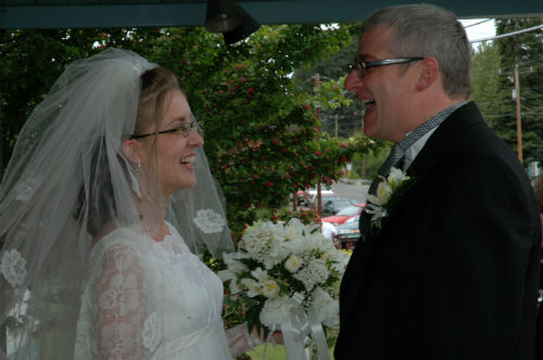 Frances and Paul Ryan facing each other in wedding picture