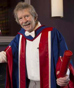 Jim Haynes posing with his honorary degree
