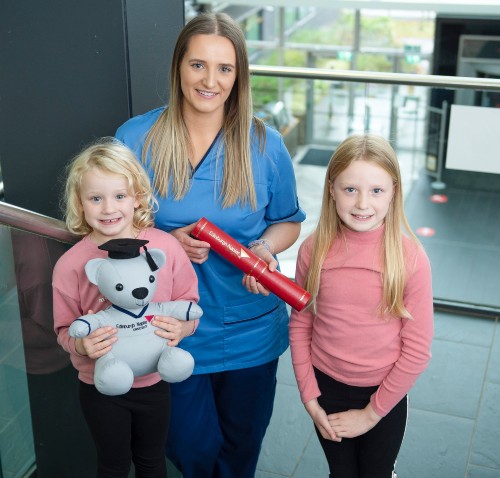 Joanna MacDonald, 2020 Simon Pullin Award winner, and her daughters at Sighthill campus
