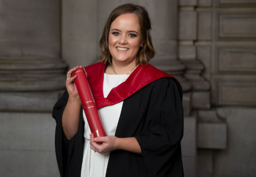 Mhairi McDonald with degree scroll outside the Usher Hall