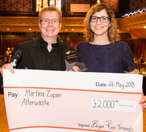 Martina Zupan accepting a large novelty prize cheque