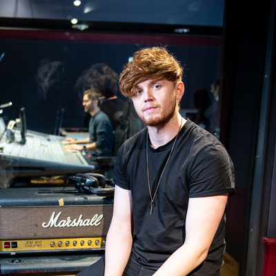 Image of Jordan Harvey in the music studio at Edinburgh Napier University
