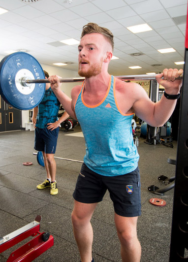 Student using weight training facilities at our Sighthill campus