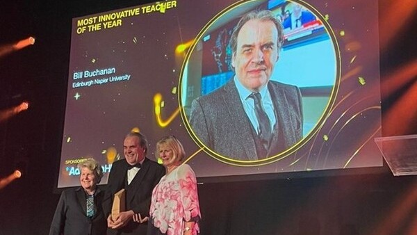 Bill winning his Times Higher Education Award