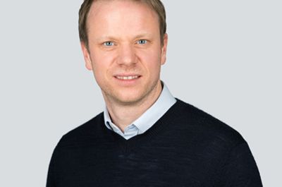 Professional image of Professor Andrew Smith, smiling 