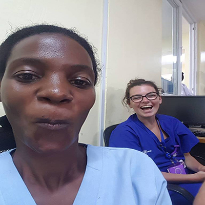 Image of Chloe and her colleague in Tanzania