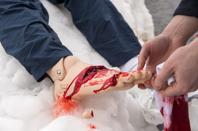 Emergency first aid training in the parking lot of Sighthill campus