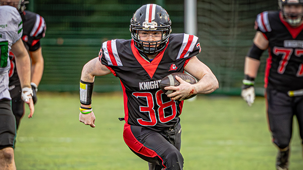 Napier Knights American Football Player running with the ball