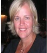 Headshot of Maggie Andrews smiling