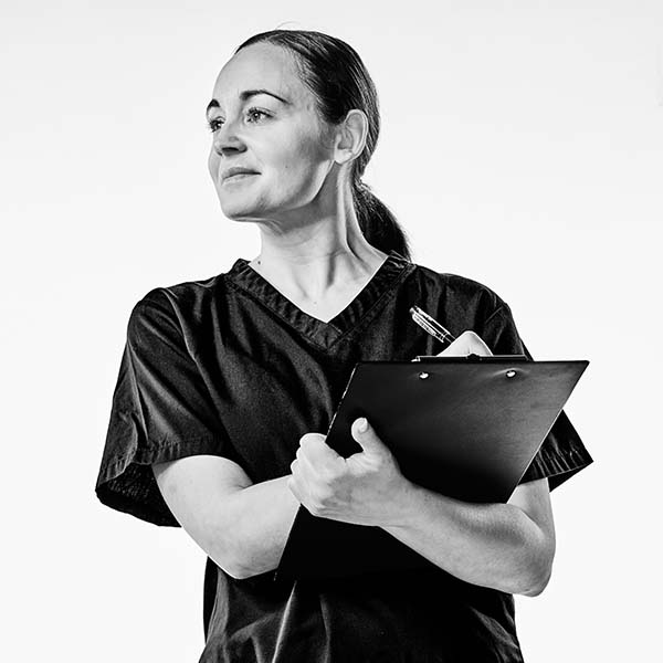 sarah, a child health nursing student at Edinburgh Napier University, stands in uniform