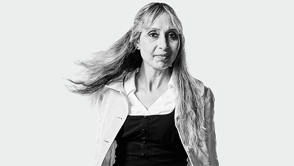 Black and white photo of Shalu looking at camera.
